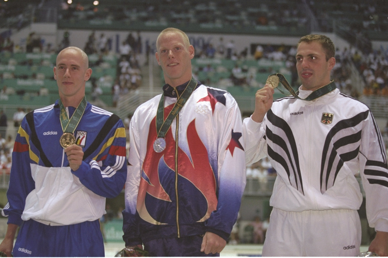 Jeremy Linn of the USA, Fred Deburghgraeve of Belgium, and Mark Warnecke of Germany. Photo via Getty Images.